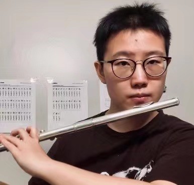 Zi Gao playing flute